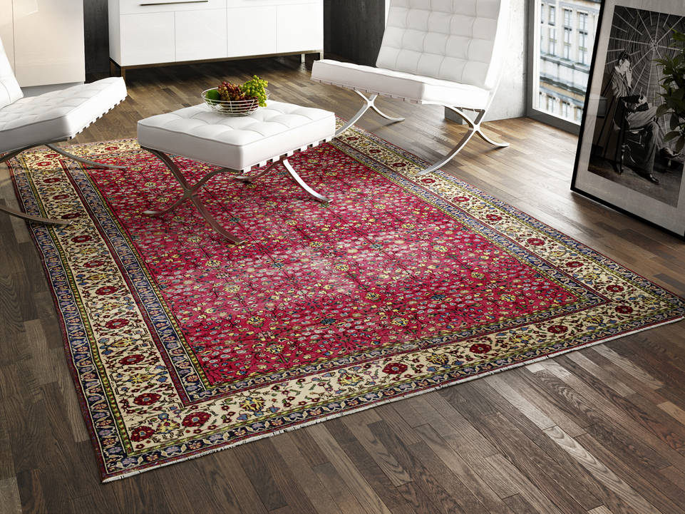 Tapete kayseri  em rosa, numa canto de leitura.